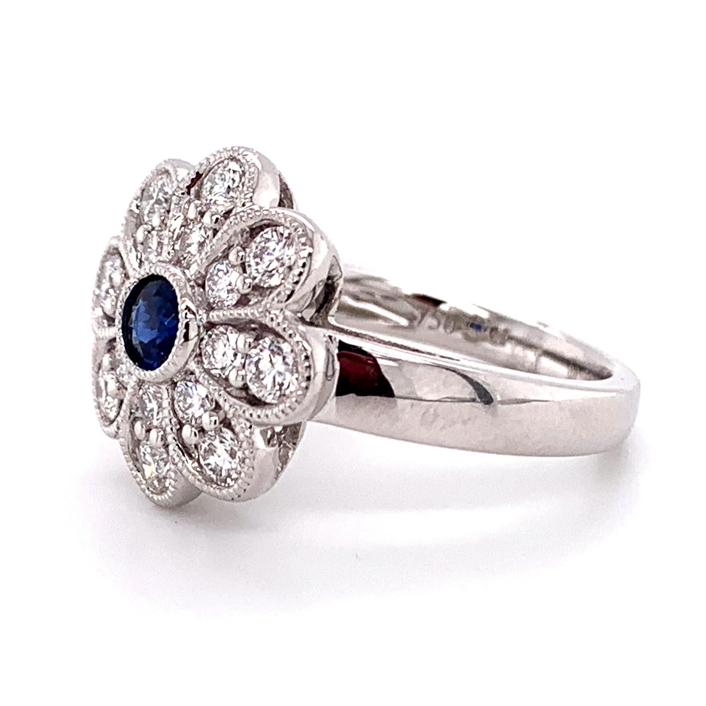 0.98CT TW SAPPHIRE AND DIAMOND ART-DECO STYLE FLOWER RING
